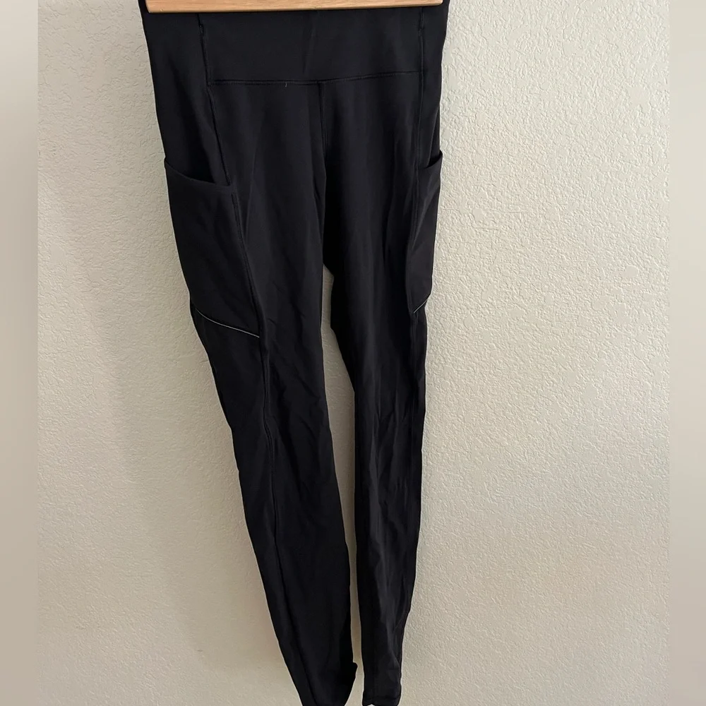 Lululemon black legging with side pockets. Size 4. 7/8 length. 27” inseam. - Picture 1 of 4